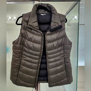 The north face olive puffer vest
